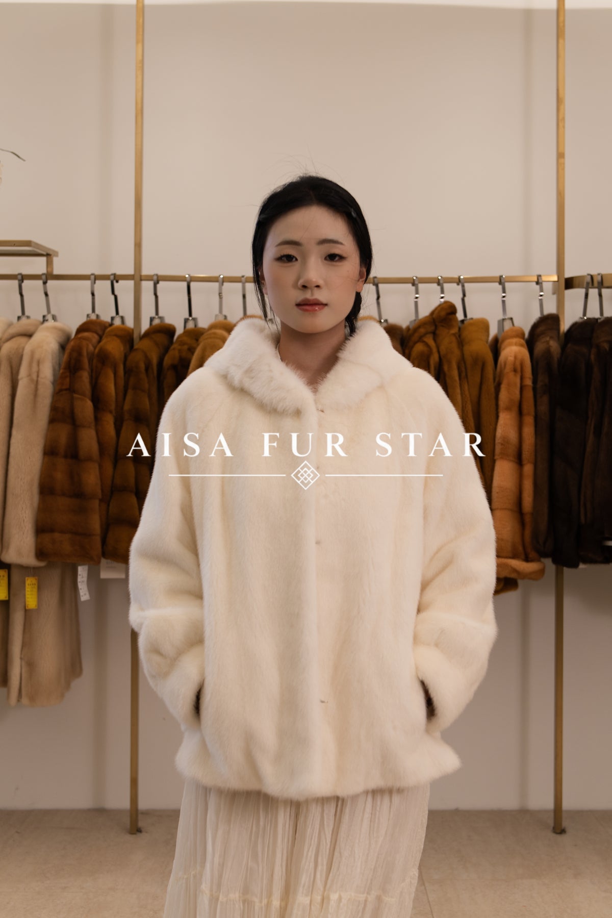 The Ivory White Hooded Mink Coat
