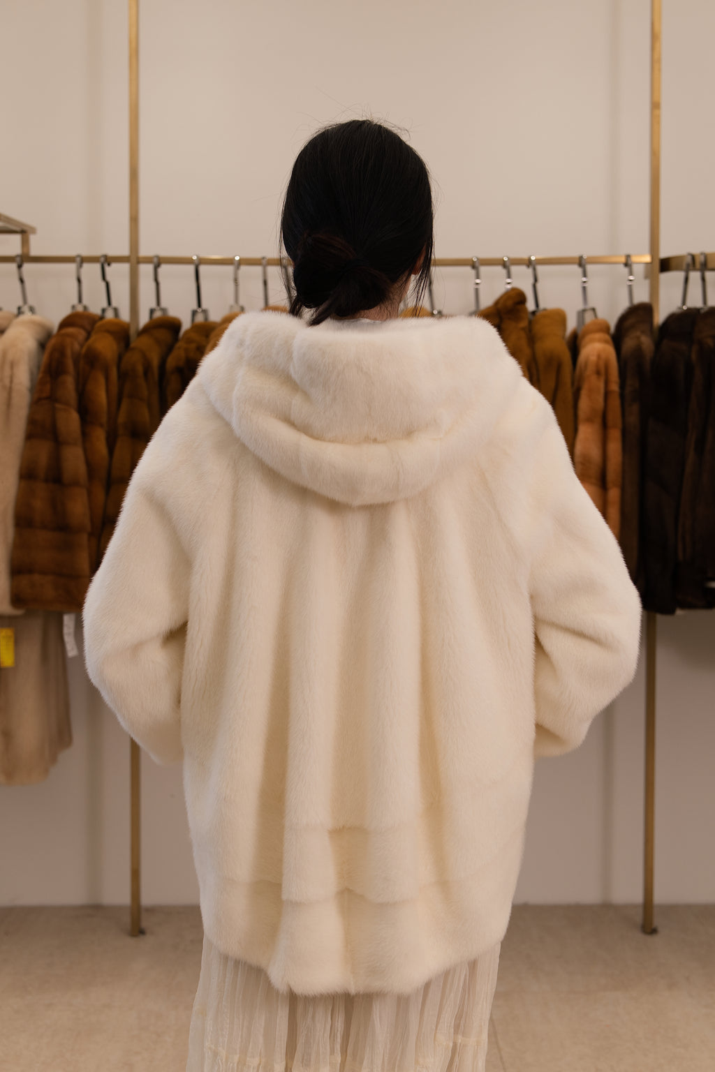 The Ivory White Hooded Mink Coat