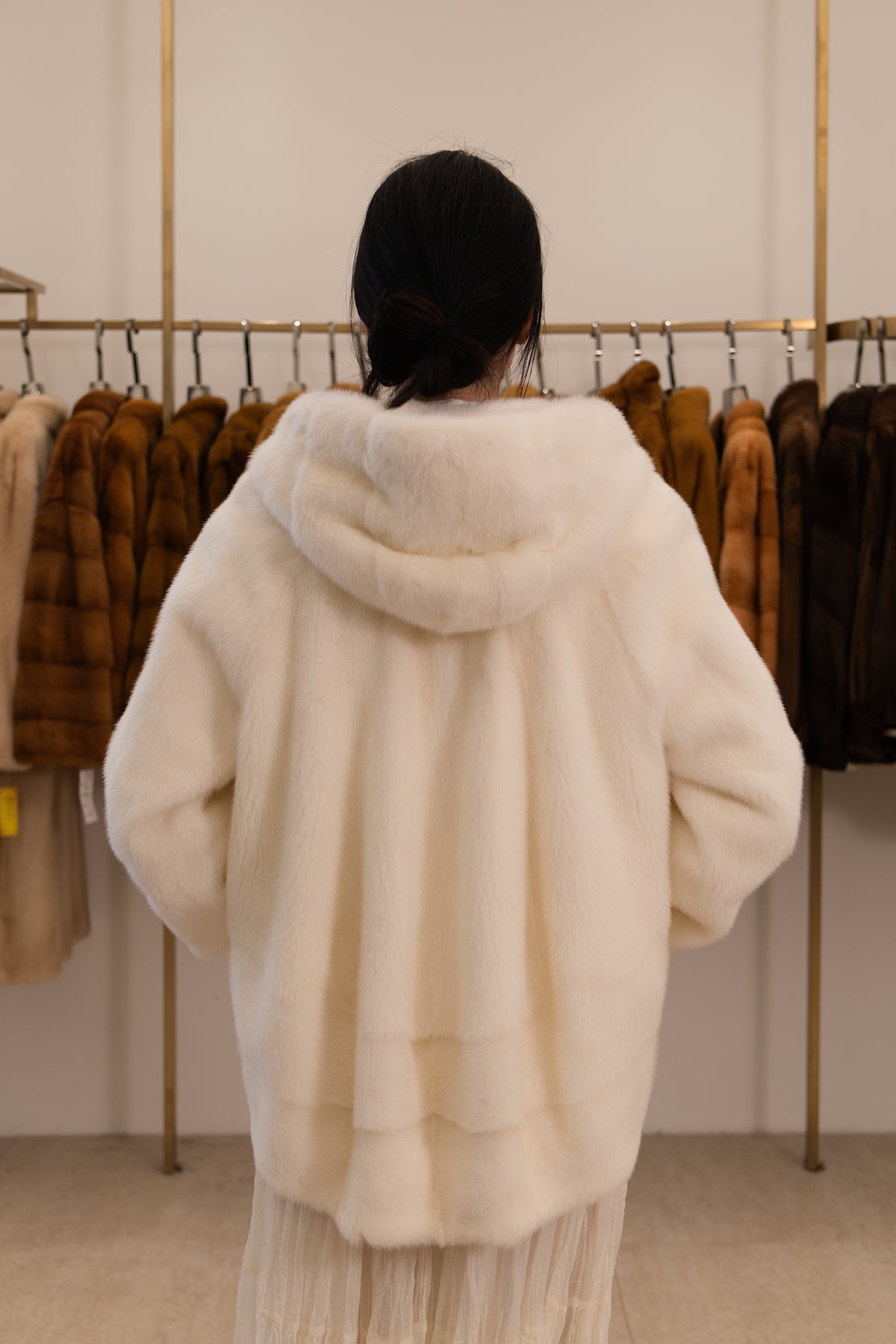 The Ivory White Hooded Mink Coat